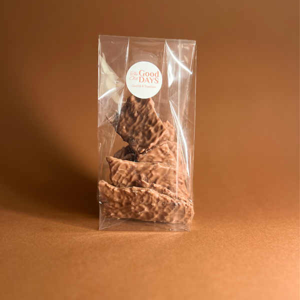 Florentine au chocolat artisanale belge The Good Old Days – amandes caramélisées et chocolat noir belge, confectionnée à la main. Sachet 120gr